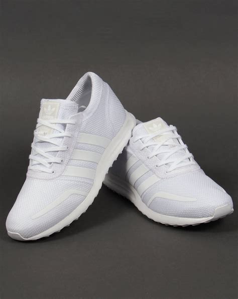 white Adidas trainers size 4